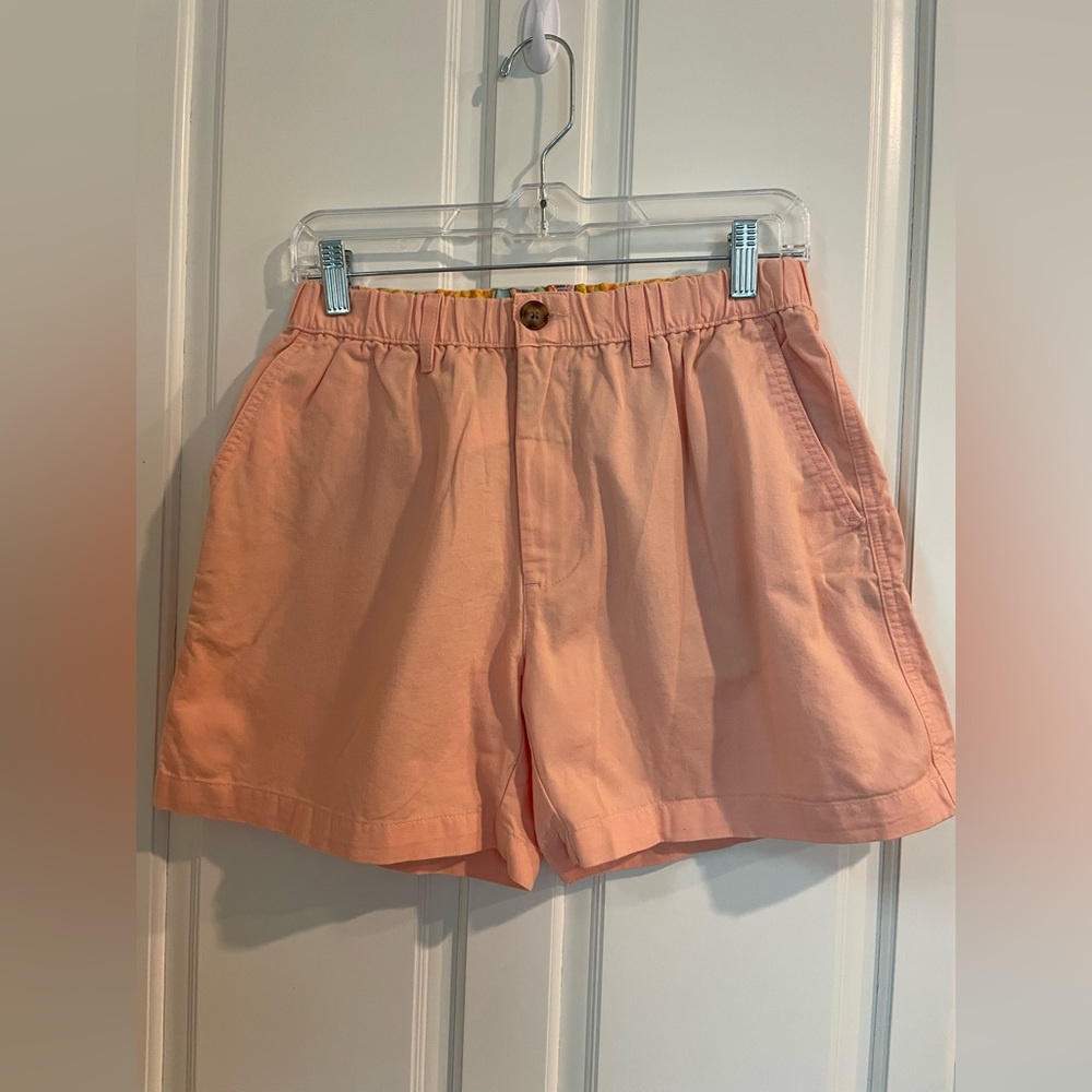 Men’s Orange Chubbies. Size medium.